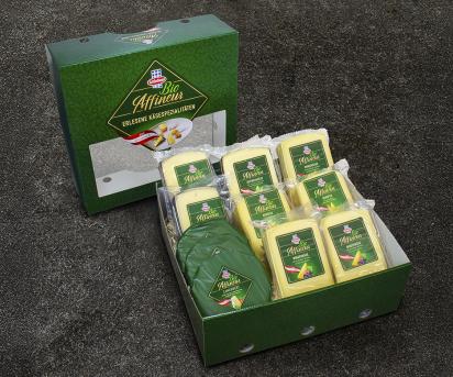 Das Bild zeigt die Bio-Käsebox mit verschiedenen Bio-Käse-Spezialitäten